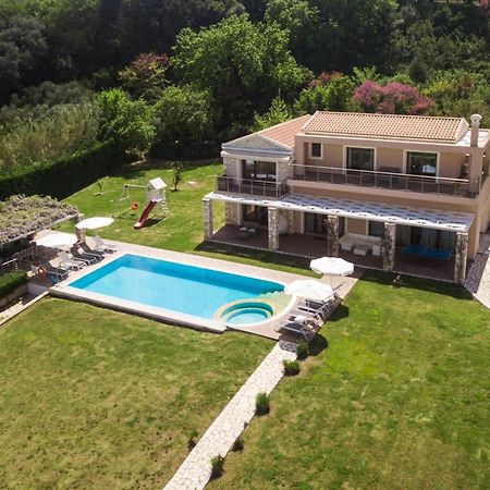 Luxury Villa Hera - Beachfront Roda  Exterior photo